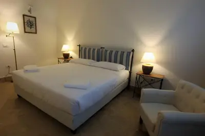 Letto o letti in una camera di Lanterne Magiche Ortigia