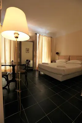 Letto o letti in una camera di Lanterne Magiche Ortigia