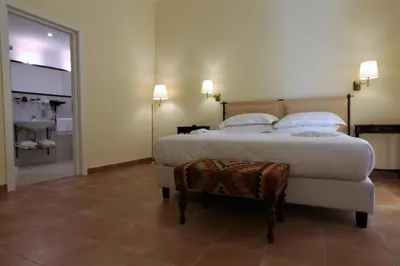 Letto o letti in una camera di Lanterne Magiche Ortigia
