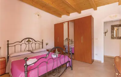 Letto o letti in una camera di Villa Antonia