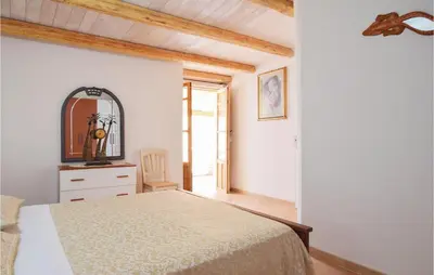 Letto o letti in una camera di Villa Antonia