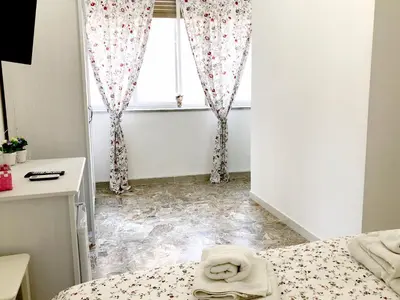 Letto o letti in una camera di Maison Ortigia
