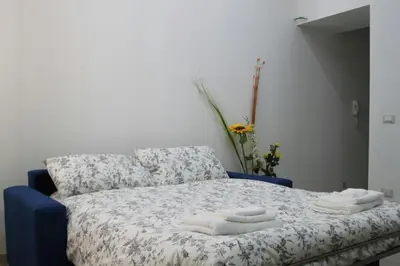 Letto o letti in una camera di Casa Vacanze Ortigia