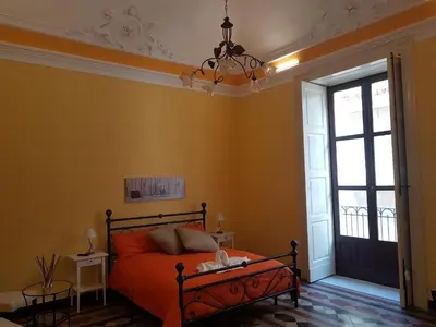 Area soggiorno di Central Suites Catania