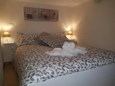 Letto o letti in una camera di Central Suites Catania