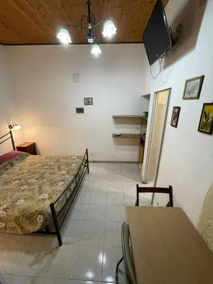 Letto o letti in una camera di Casa del vico