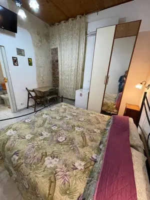 Letto o letti in una camera di Casa del vico