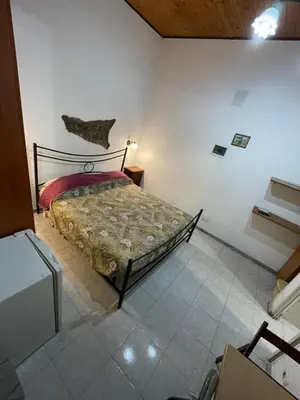 Letto o letti in una camera di Casa del vico