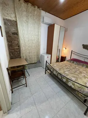 Letto o letti in una camera di Casa del vico