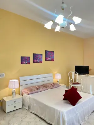 Letto o letti in una camera di Villa Santa Barbara