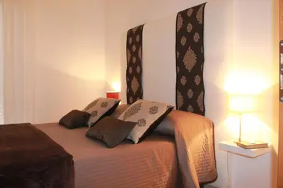 Letto o letti in una camera di Domus Claudia - Casa Vacanze
