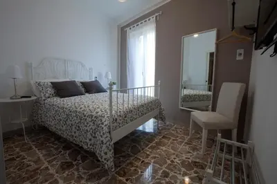Letto o letti in una camera di Casa Madonna delle Grazie
