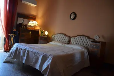Letto o letti in una camera di B&B Chapo