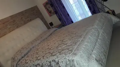 Letto o letti in una camera di Cappuccini