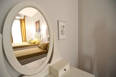 Letto o letti in una camera di B&B Marina di Ortigia