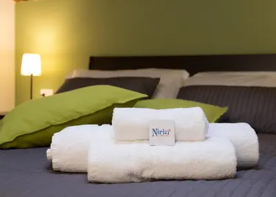 Letto o letti in una camera di Niria