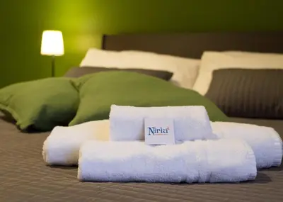 Letto o letti in una camera di Niria