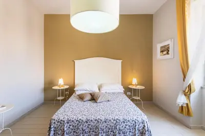 Letto o letti in una camera di Il 49 Rooms Noto