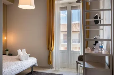Letto o letti in una camera di Il 49 Rooms Noto