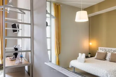 Letto o letti in una camera di Il 49 Rooms Noto