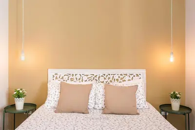 Letto o letti in una camera di Il 49 Rooms Noto