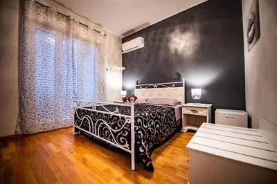 Letto o letti in una camera di BnB Cheope
