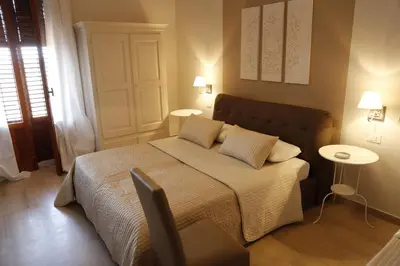 Letto o letti in una camera di Simonetta's Rooms