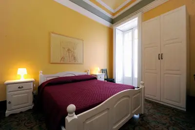 Letto o letti in una camera di B&B Porta della Terra