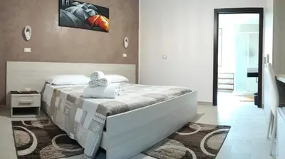Letto o letti in una camera di Guest House Elettra