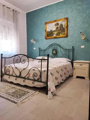 Letto o letti in una camera di Guest House Elettra