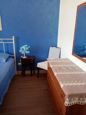 Letto o letti in una camera di Appartamento Mariella via Lipari n 8