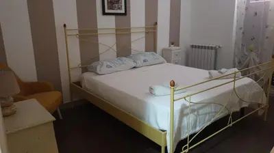 Letto o letti in una camera di Appartamento Mariella via Lipari n 8