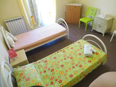 Letto o letti in una camera di Appartamento Mariella via Lipari n 8