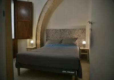 Letto o letti in una camera di Il Vinile Apartment