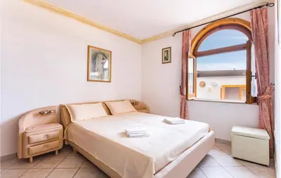 Letto o letti in una camera di Villa Gelsomino