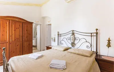 Letto o letti in una camera di Villa Gelsomino