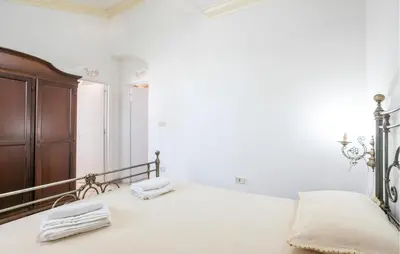 Letto o letti in una camera di Villa Gelsomino