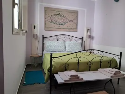 Letto o letti in una camera di La casa di Aneupe