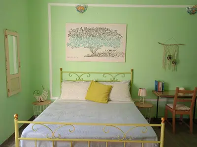 Letto o letti in una camera di La casa di Aneupe