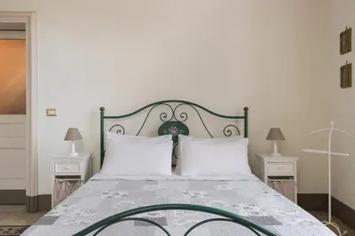 Letto o letti in una camera di Palazzo Arcidiacono - luxury holidays