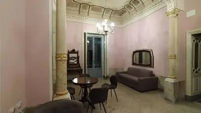 Area soggiorno di Palazzo Arcidiacono - luxury holidays