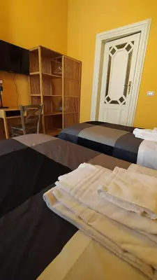 Letto o letti in una camera di Palazzo Arcidiacono - luxury holidays