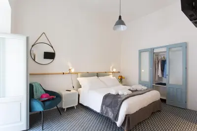 Letto o letti in una camera di Intervallo Boutique Hotel