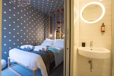 Letto o letti in una camera di Intervallo Boutique Hotel