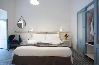 Letto o letti in una camera di Intervallo Boutique Hotel