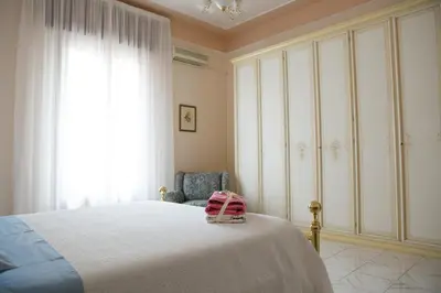 Letto o letti in una camera di Casa Gambuzza