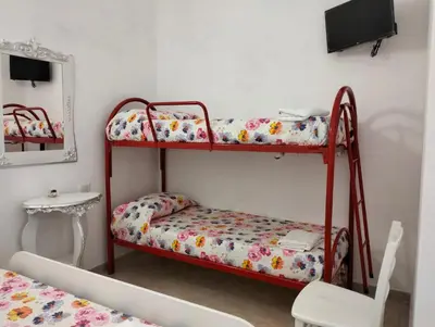 Letto o letti in una camera di Orazio U Vitturisi