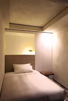 Letto o letti in una camera di Hotel Romano House