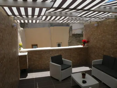 Area soggiorno di Al Blu Ortigia Apartments