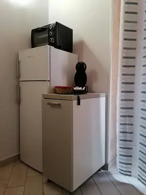 Cucina o angolo cottura di Al Blu Ortigia Apartments